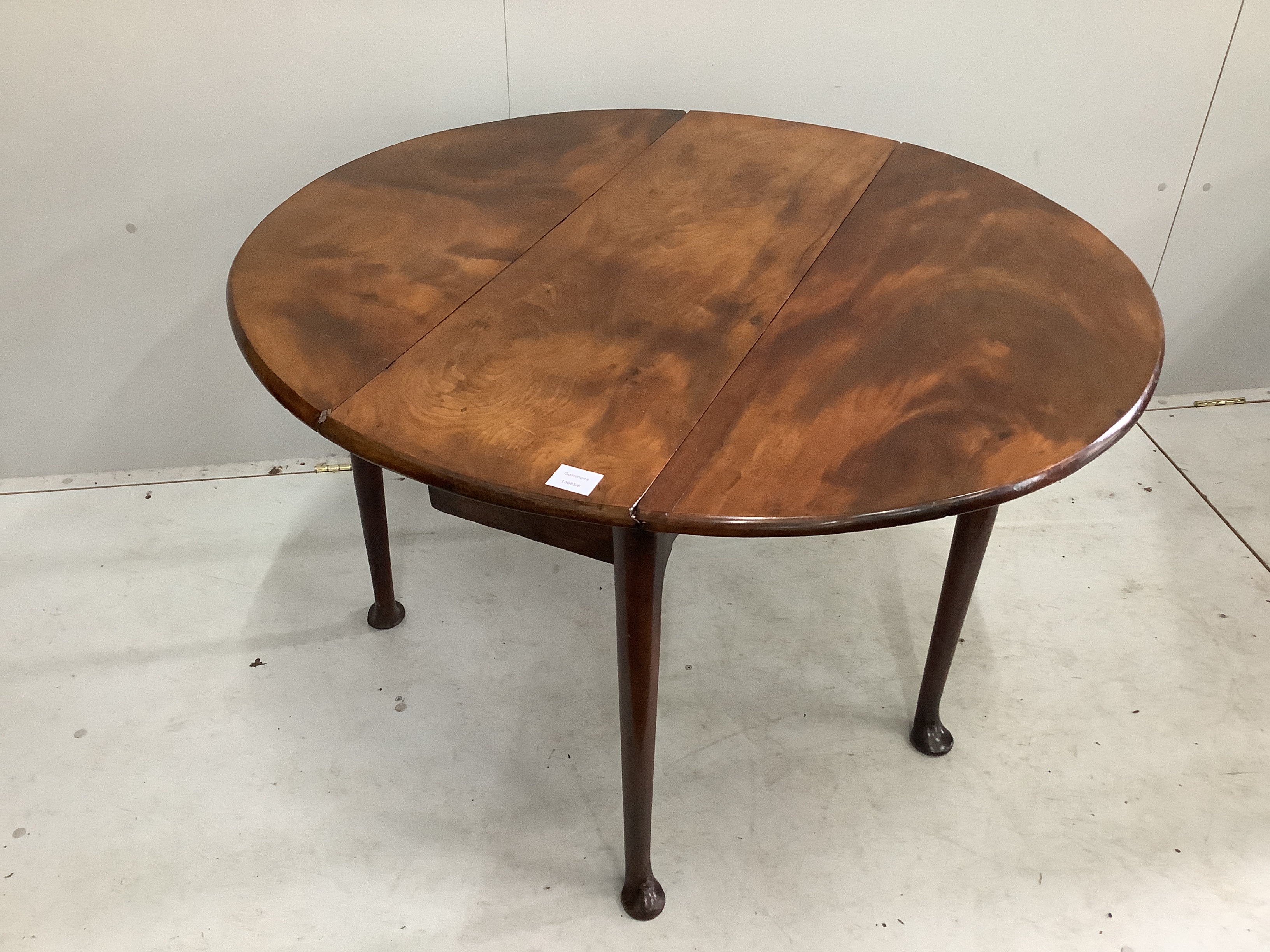 A George III mahogany drop leaf pad foot dining table, width 95cm, depth 34cm, height 69cm